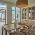 This is a photo of The Seville's arts and crafts room, which features abundant natural light and workspace for various craft projects.